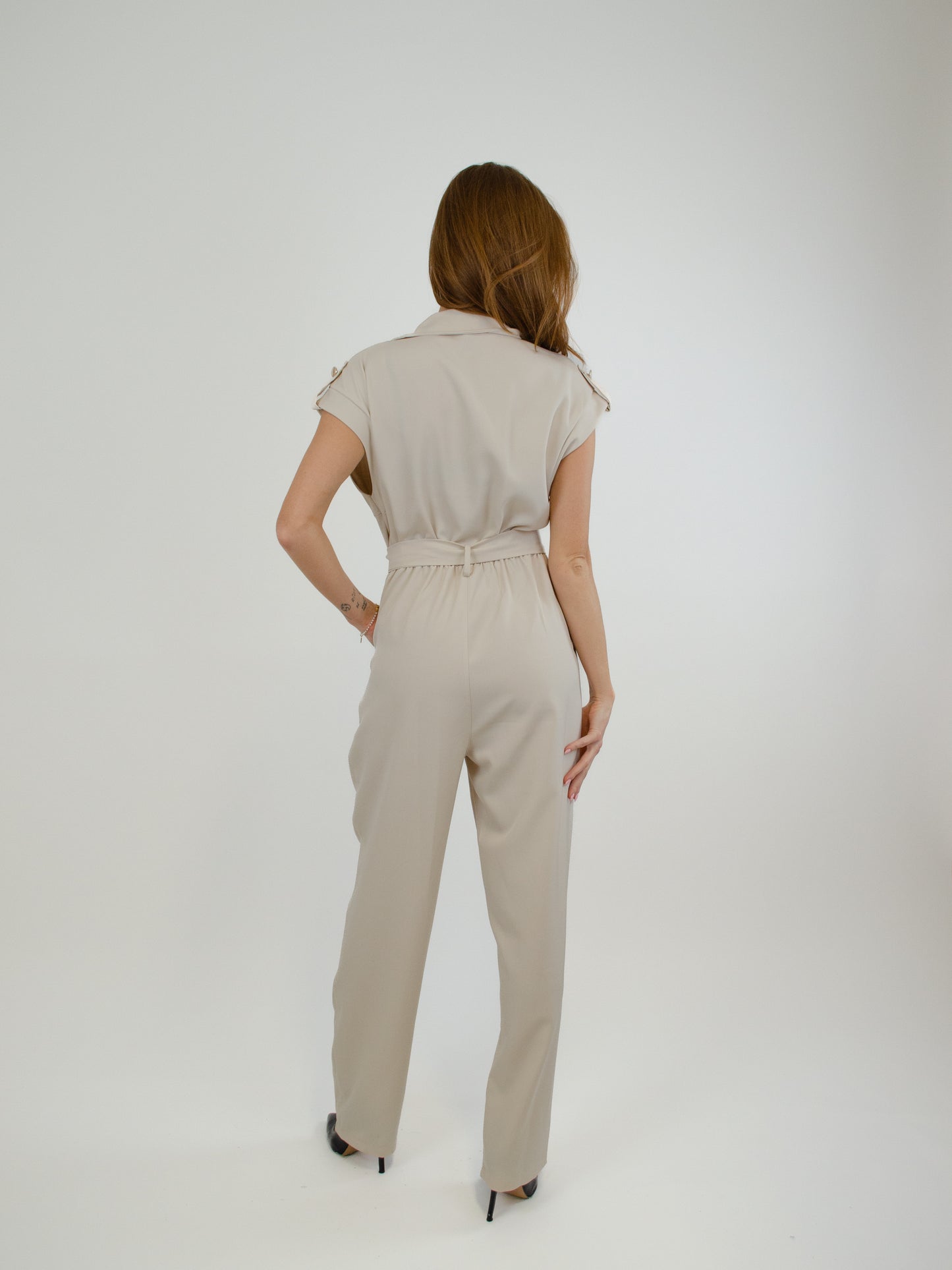 Tuta con bottone gioiello