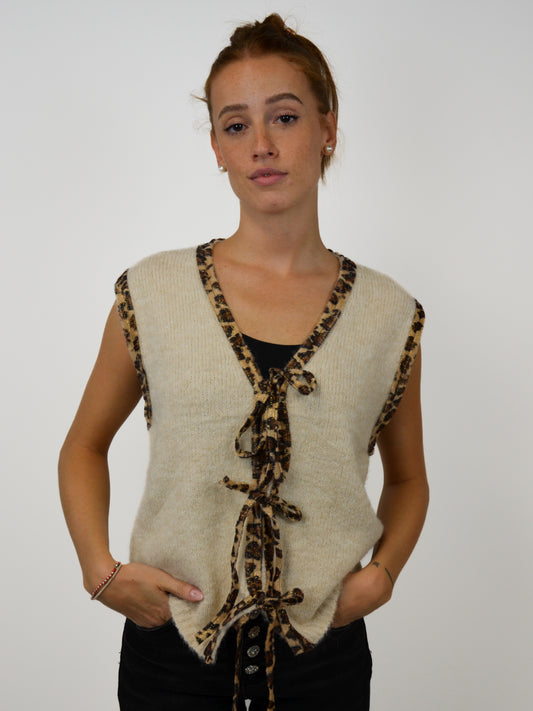 Gilet in lana con laccetti