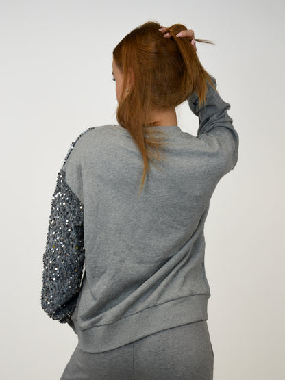 Felpa con patch in paillettes